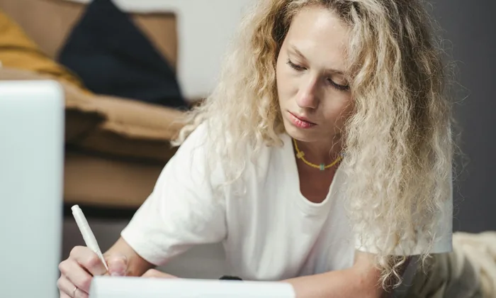 Parent writing a formal IEP evaluation request